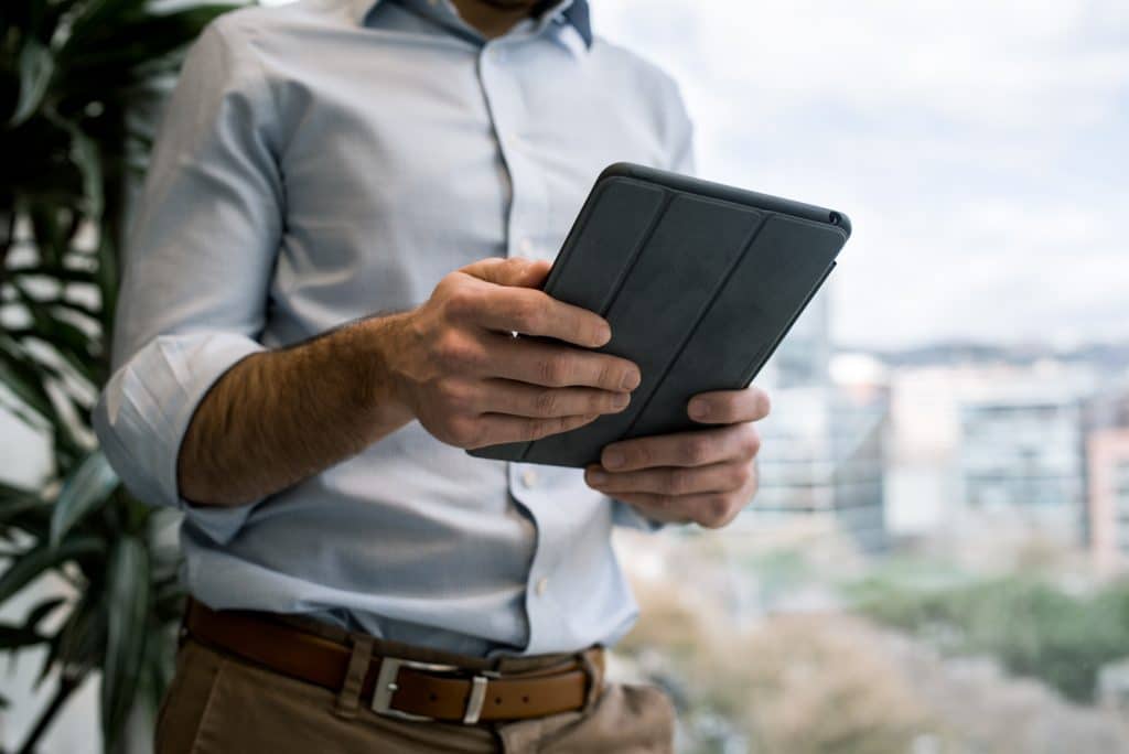 A man on an iPad