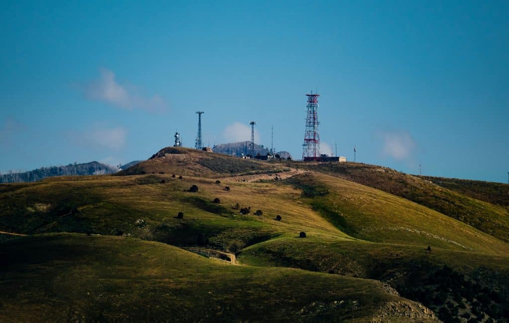 Cell towers on rolling hills